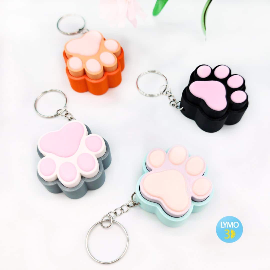 Llavero clicker huella de gato