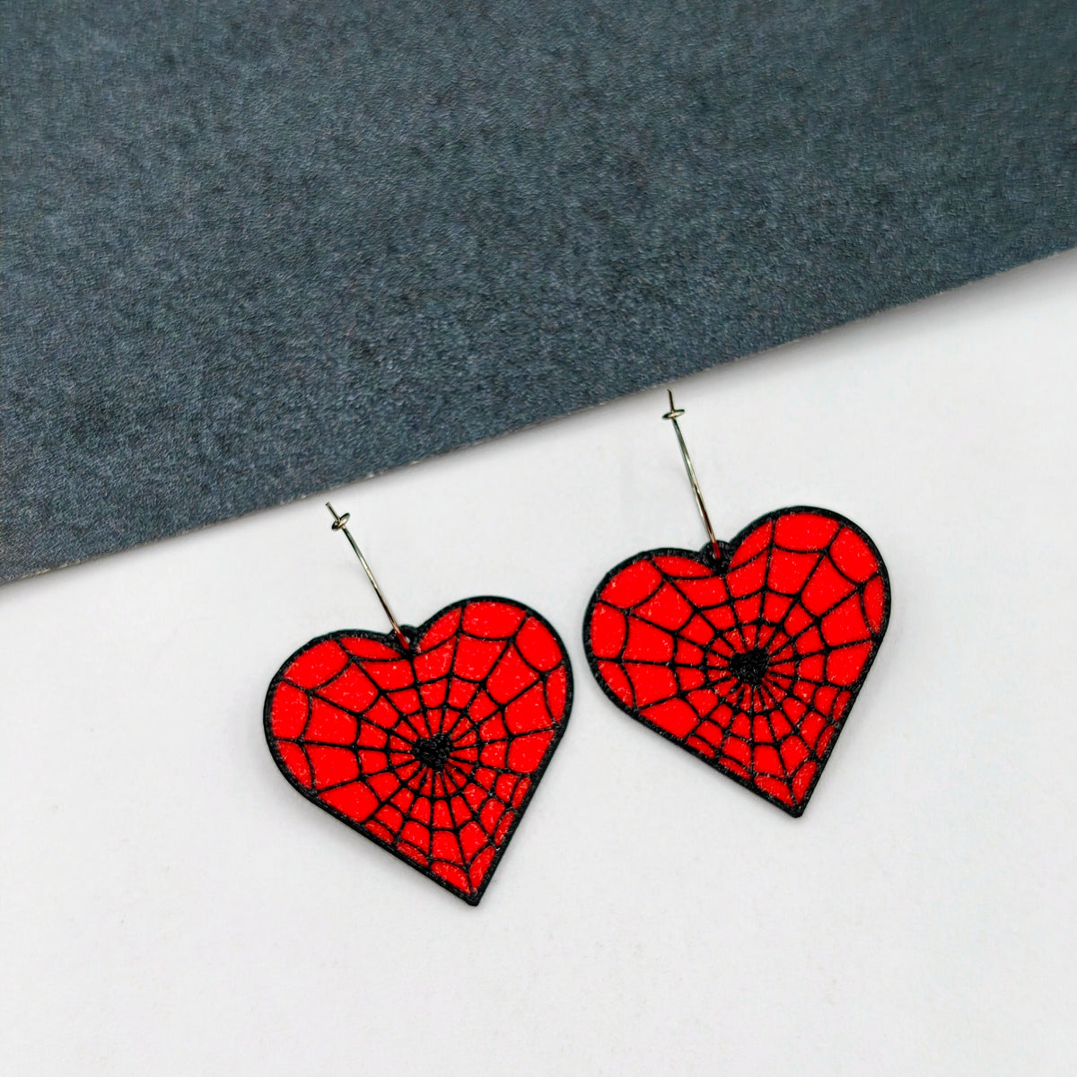 Pendientes telaraña roja