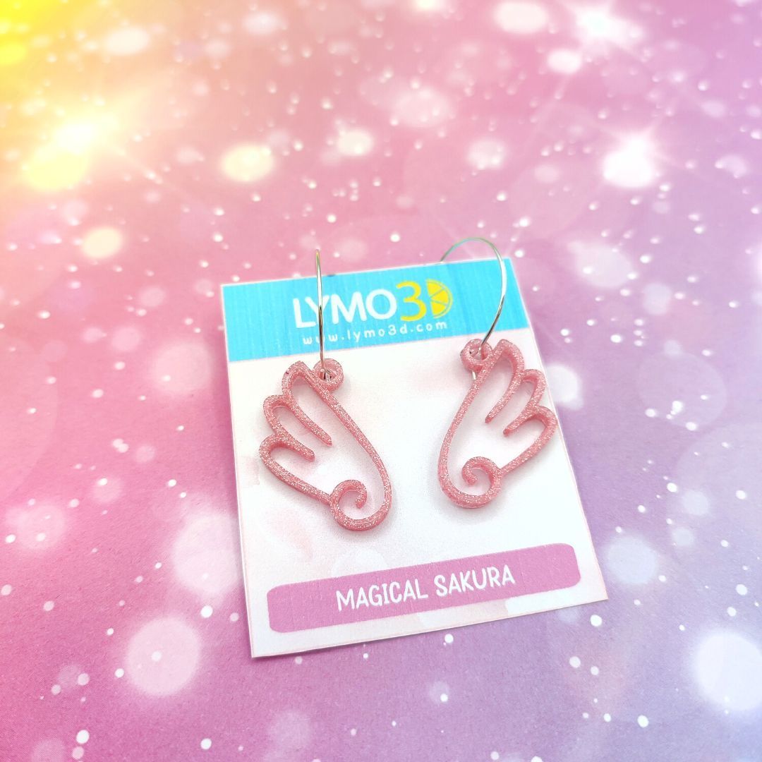 Pendientes alas rosa purpurina