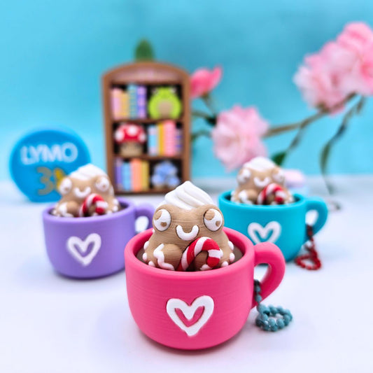 Llavero clicker rana de jengibre en taza