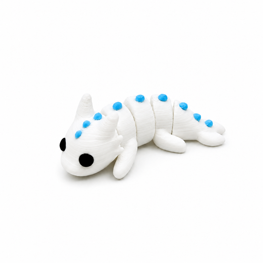 Mini dragón blanco articulado que brilla en la oscuridad