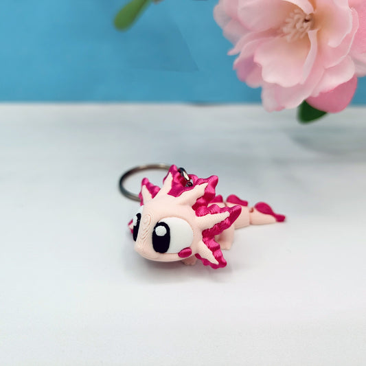 Llavero articulado de ajolote rosa