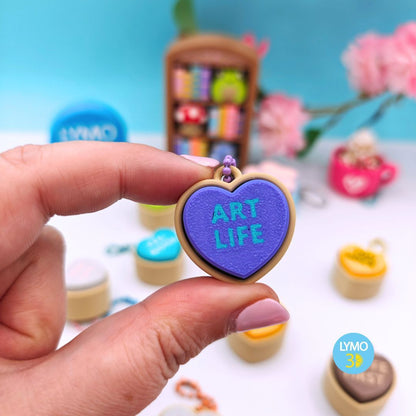 Llavero clicker corazón con texto