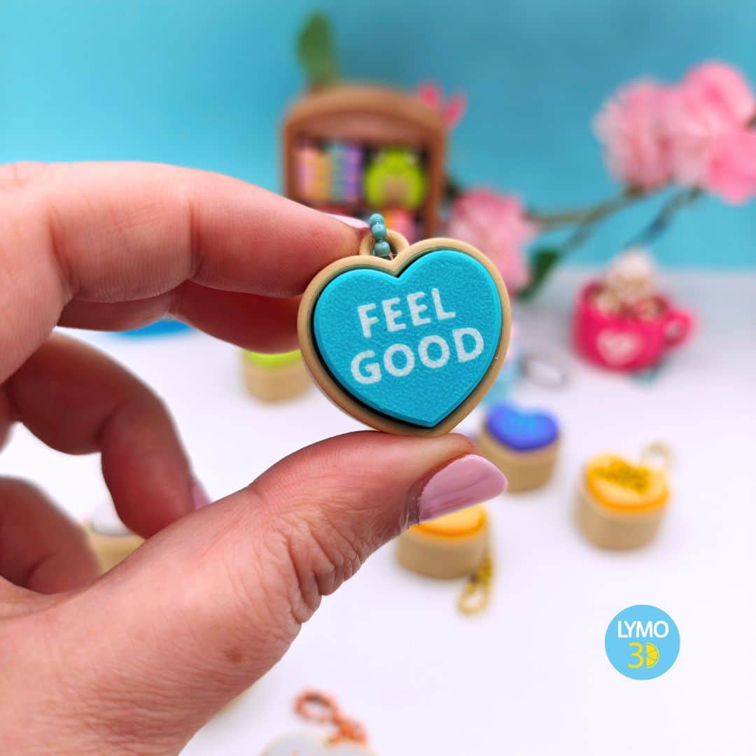 Llavero clicker corazón con texto