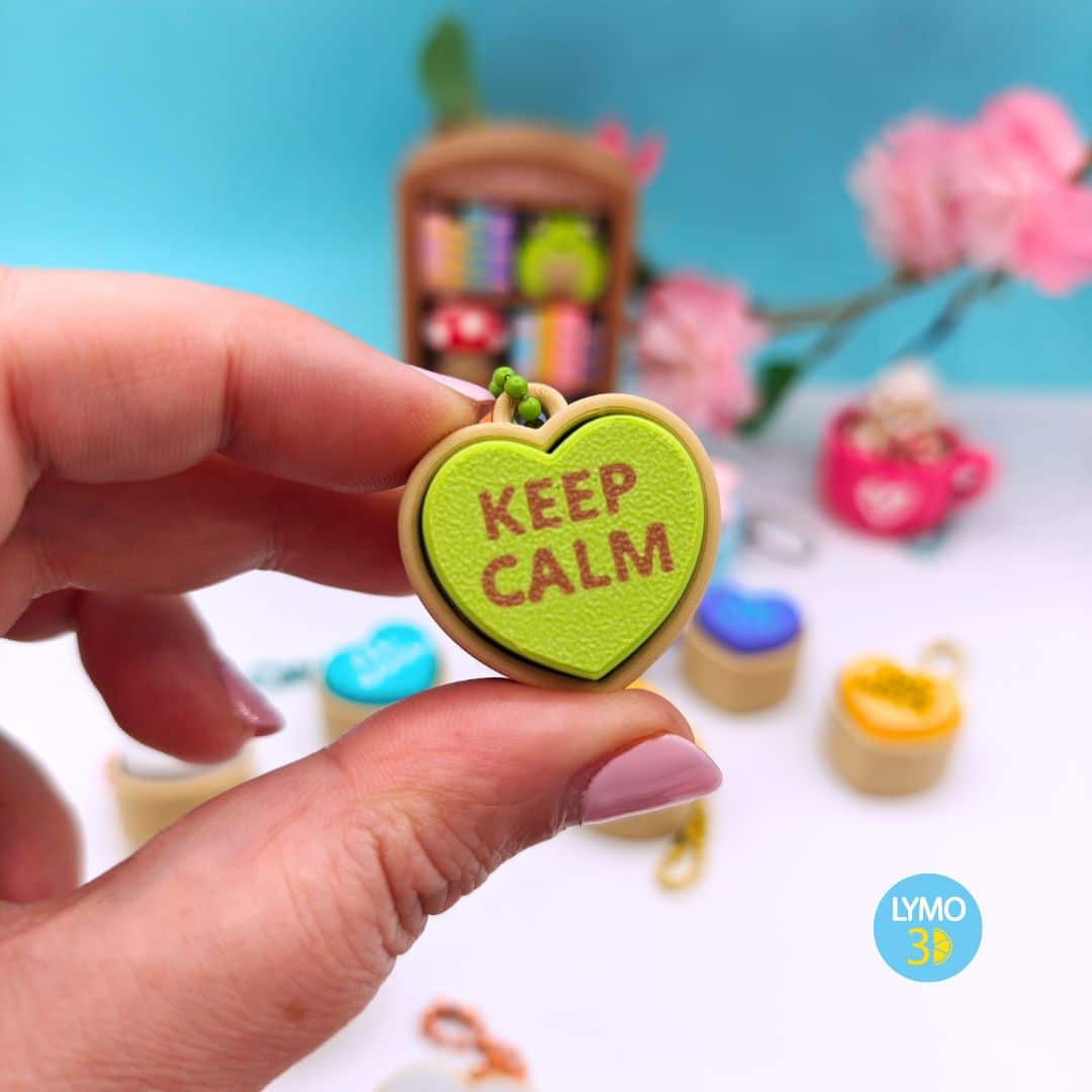 Llavero clicker corazón con texto