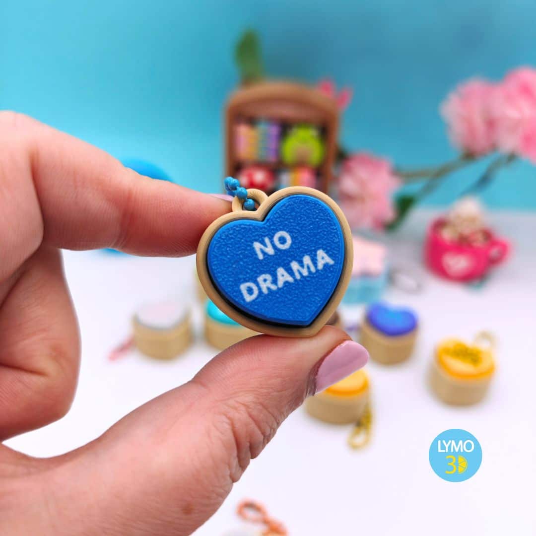 Llavero clicker corazón con texto