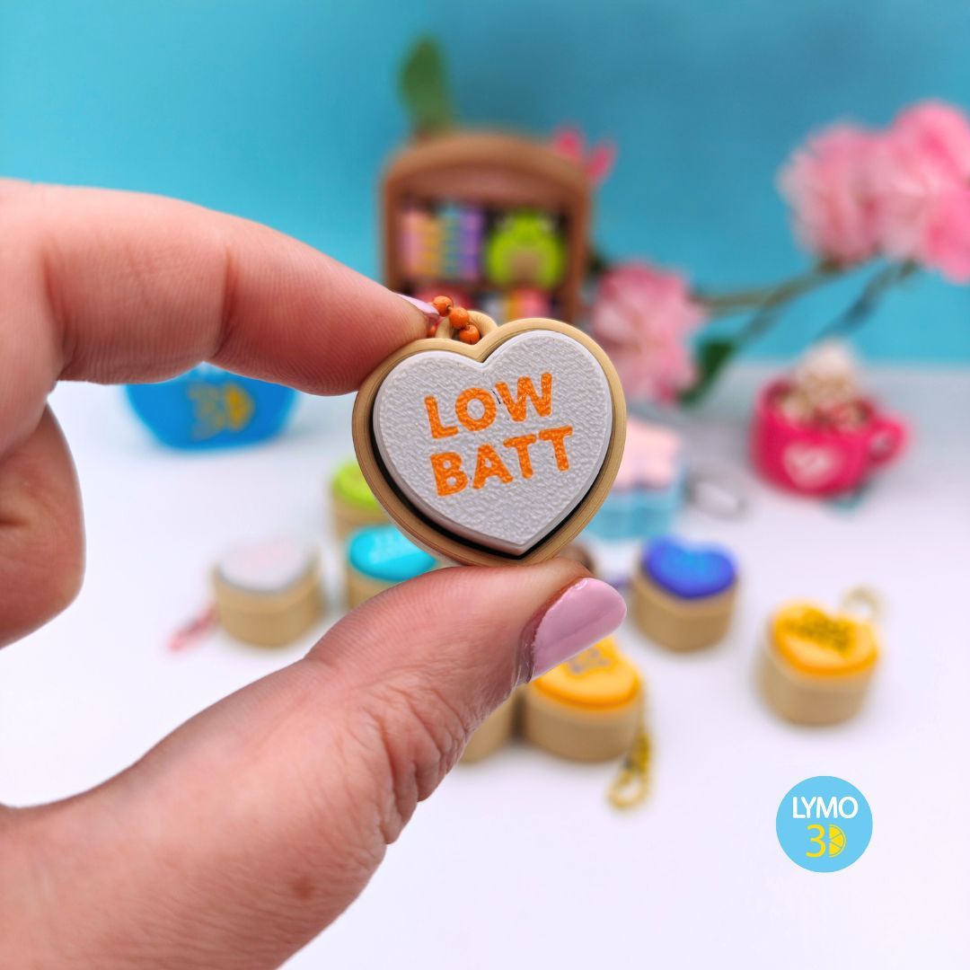 Llavero clicker corazón con texto