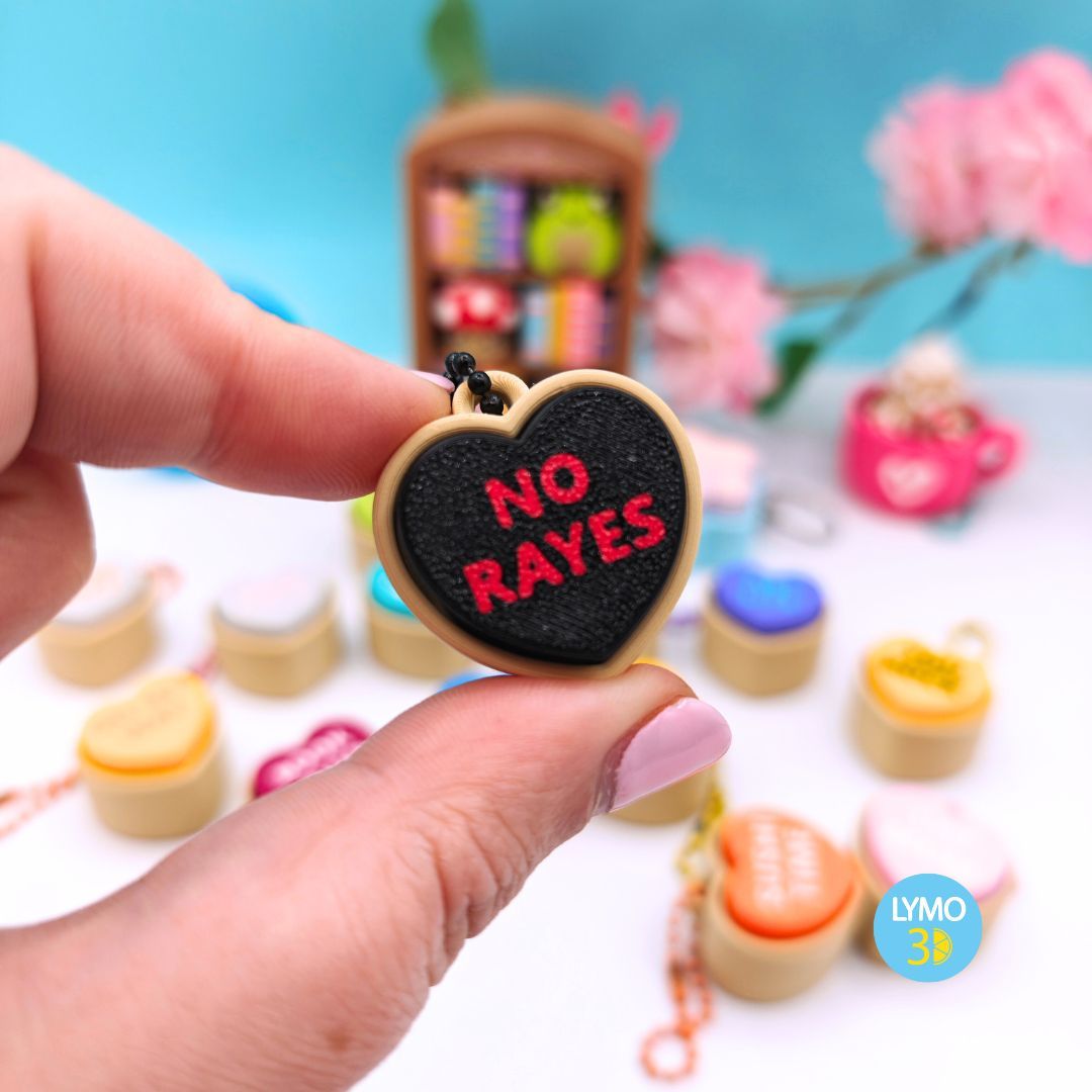 Llavero clicker corazón con texto