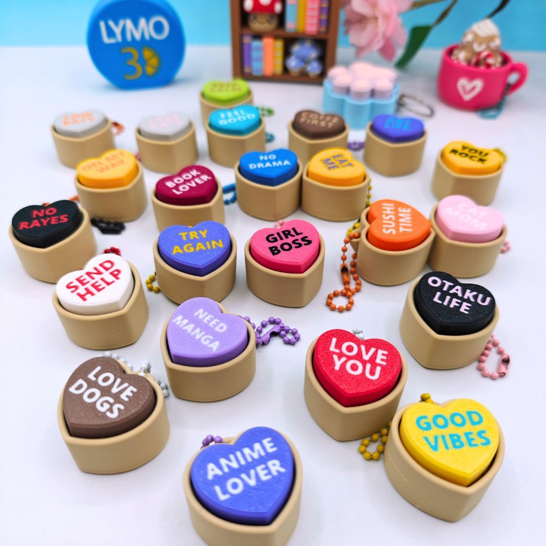 Llavero clicker corazón con texto