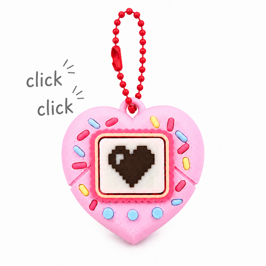 Heart-shaped clicker keychain with candy sprinkles
