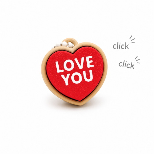 Heart-shaped clicker keychain with text