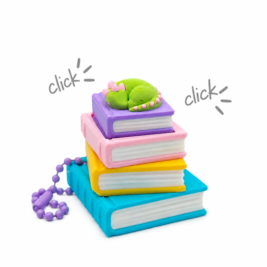 Book clicker keychain with kitten