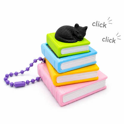 Schlüsselanhänger mit Buchklicker und Kätzchen