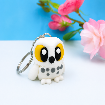 Articulated owl keychain