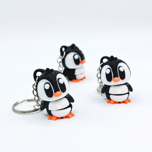 Llavero pingüino articulado