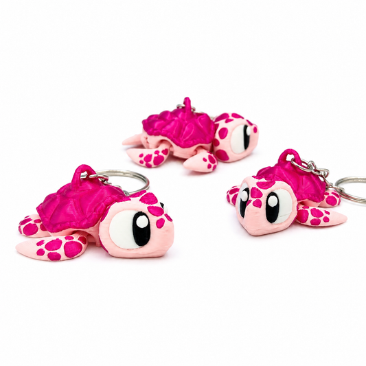 Llavero tortuga rosa articulada