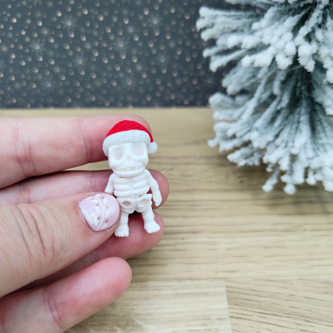 Mini huesitos navideño articulado