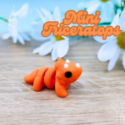 Mini triceratops naranja articulado (1)