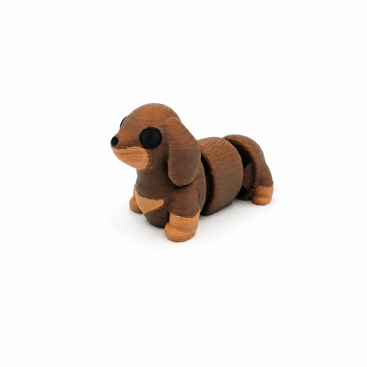 Mini perro salchicha articulado
