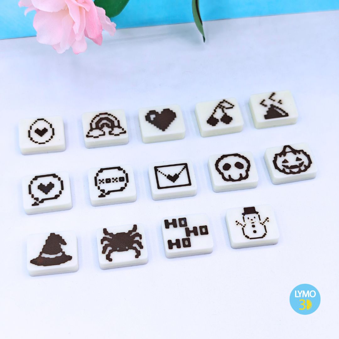 Heart-shaped clicker keychain with candy sprinkles
