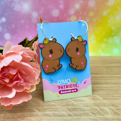 Pendientes capibara con pollito kawaii