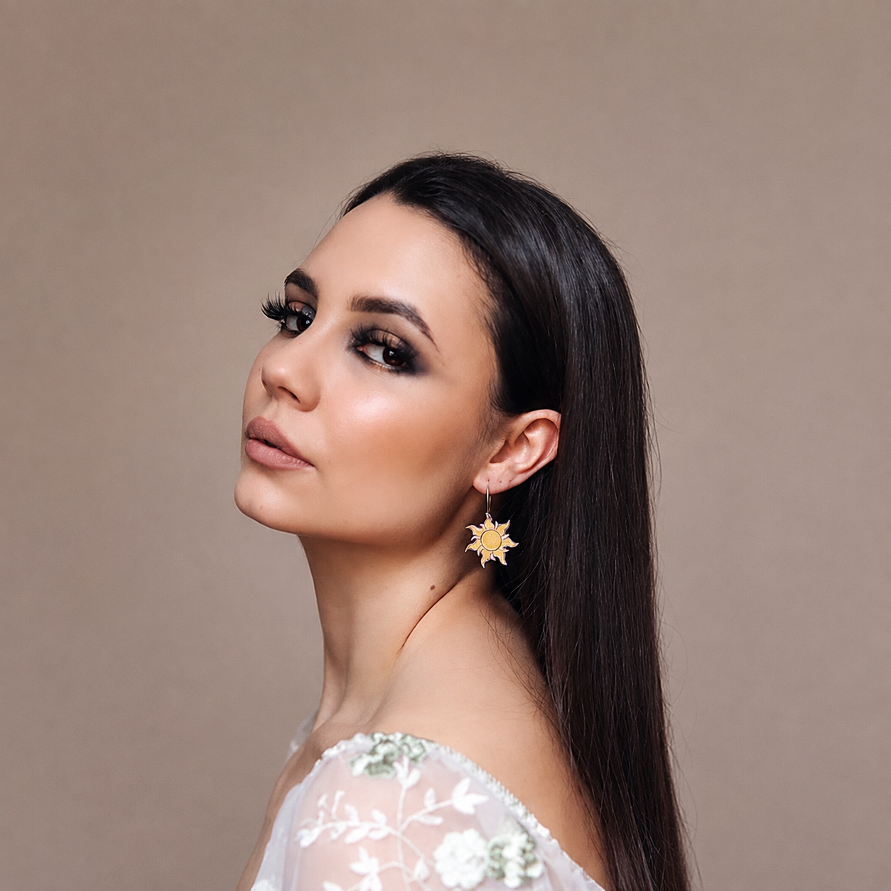 tangled sun earrings