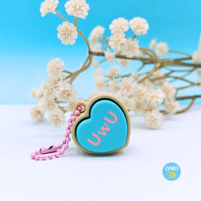 Llavero clicker corazón con texto