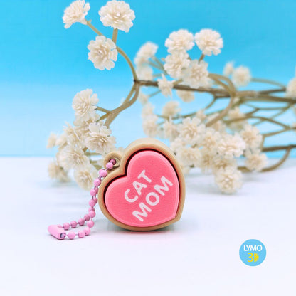 Llavero clicker corazón con texto