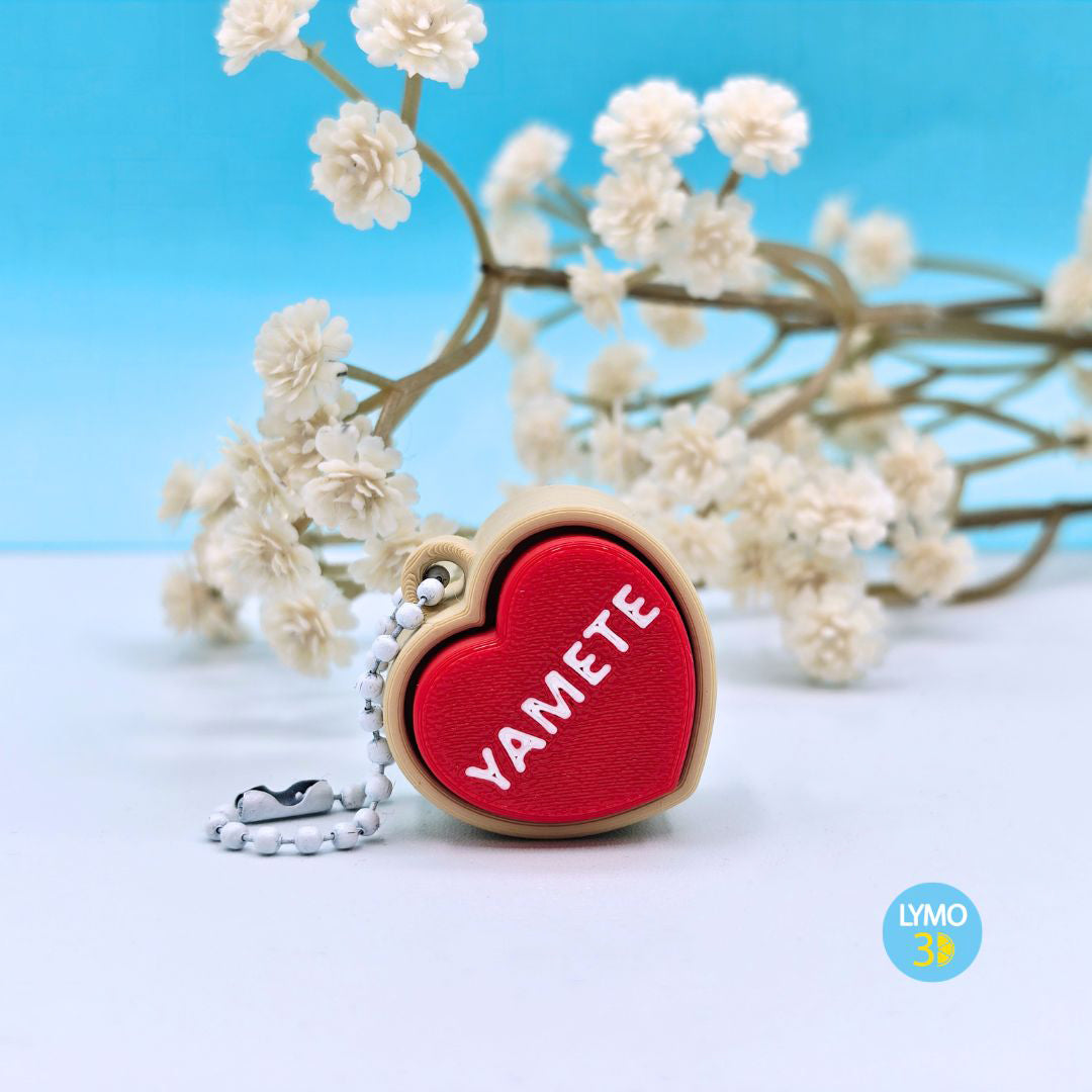 Llavero clicker corazón con texto