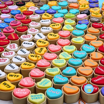 Llavero clicker corazón con texto