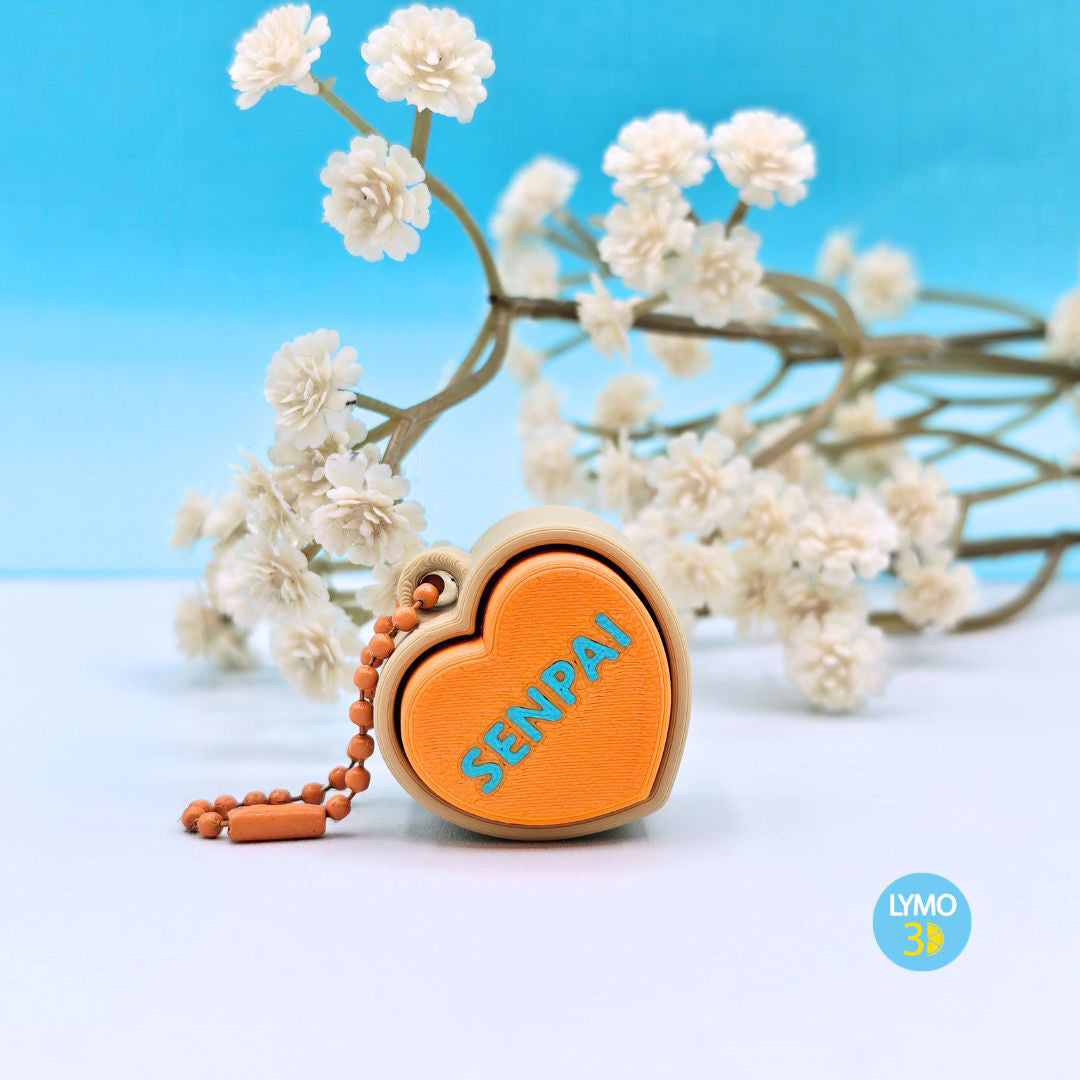 Llavero clicker corazón con texto