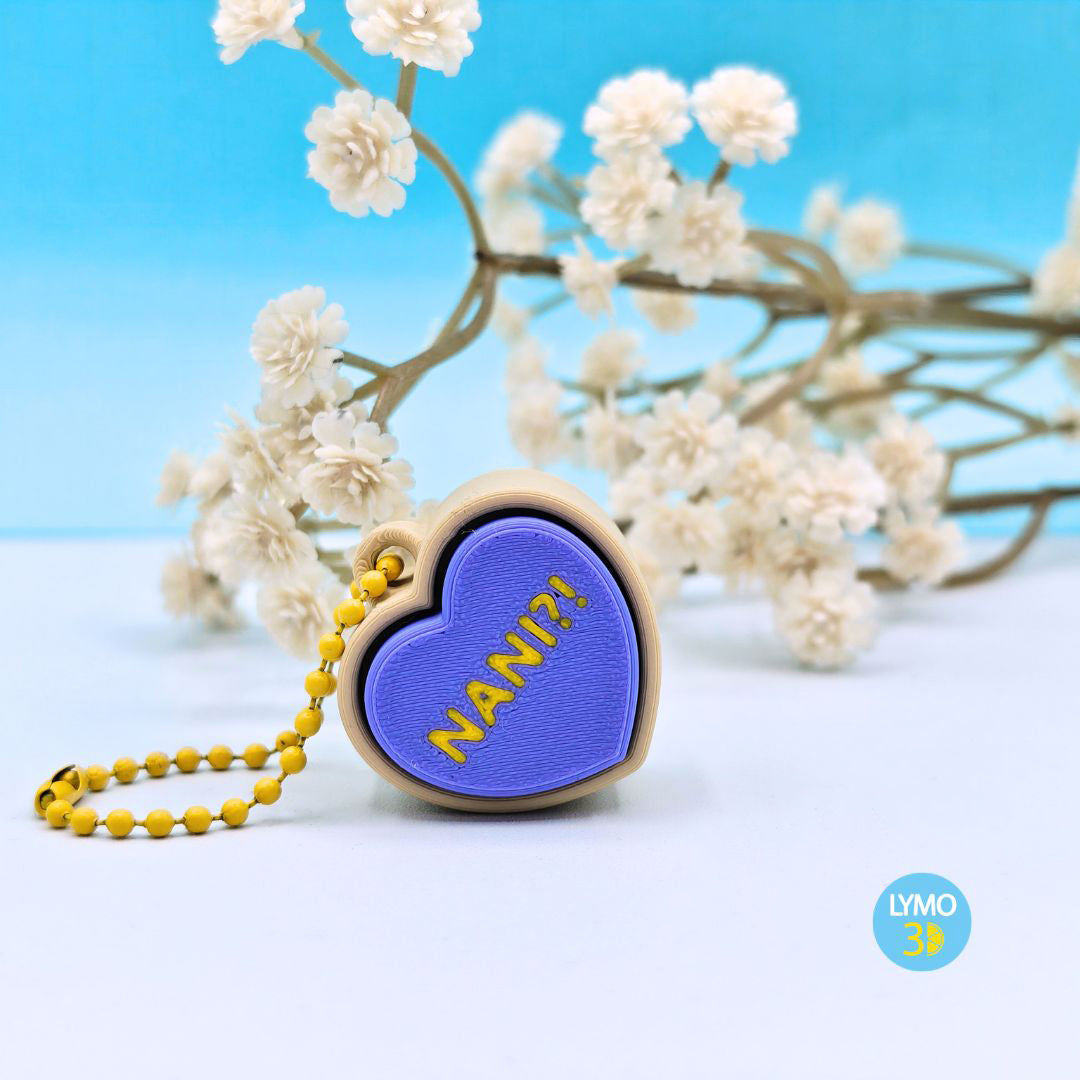 Llavero clicker corazón con texto