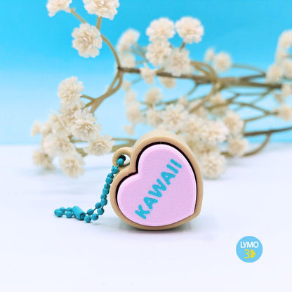 Llavero clicker corazón con texto