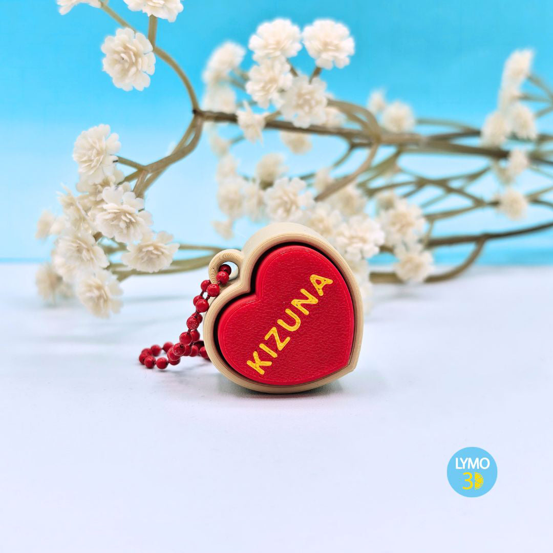 Llavero clicker corazón con texto