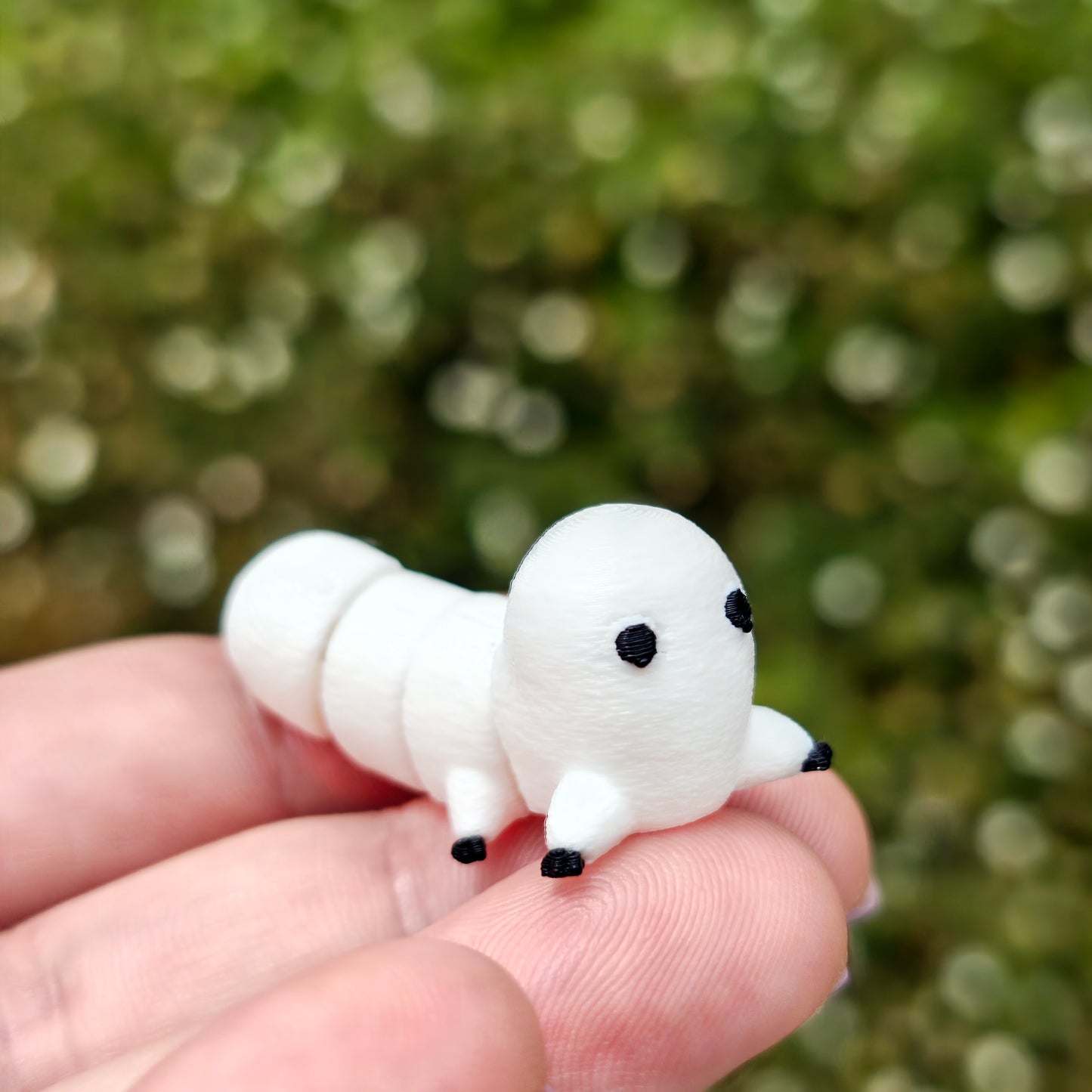Mini gusano mágico articulado